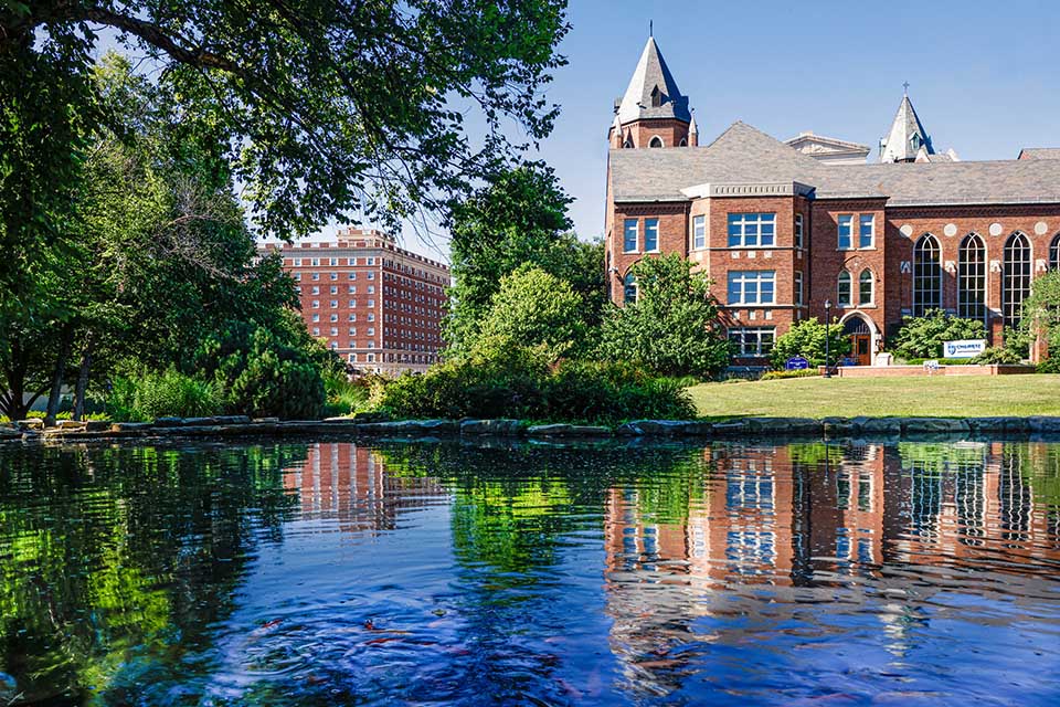 Cook school exterior with water in foreground