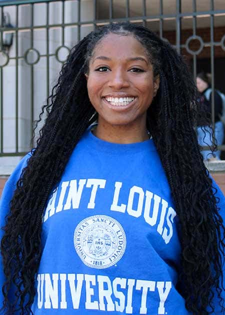 A headshot of Ayshia Holman