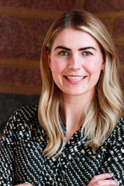 A headshot photo of Livi Logan-Wood.