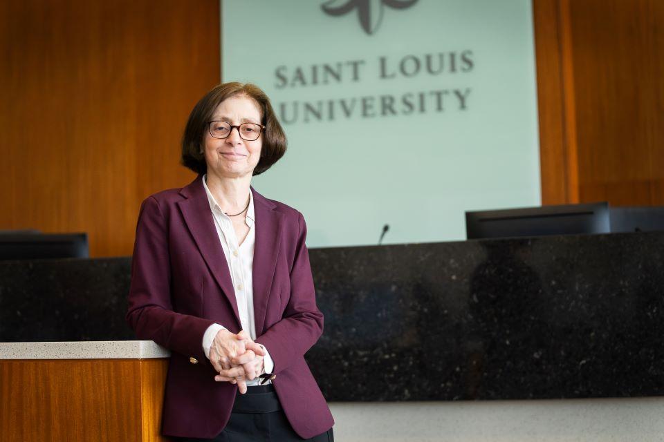 Wendy Parmet poses in the courtroom in Scott Hall for the annual health law symposium