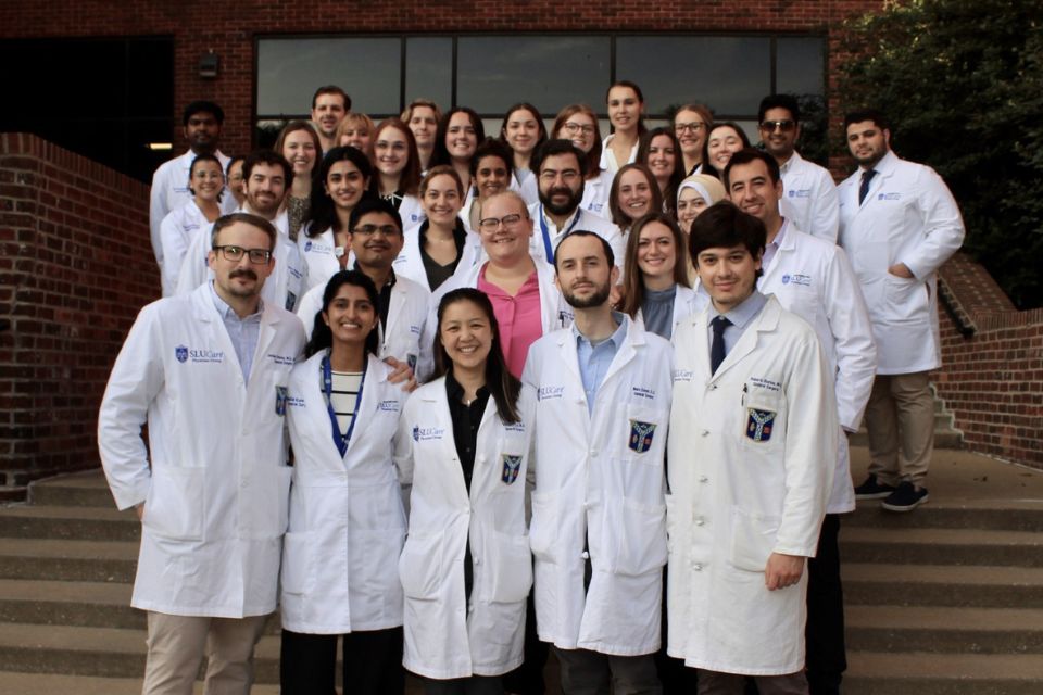 A group photo of residents in the general surgery residency program