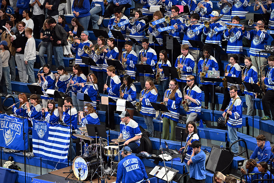 The Billiken Pep Band The Billiken Pep Band, featuring dozens of musicians in blue-and-white Billiken hockey jerseys, plays at Chaifetz Arena.